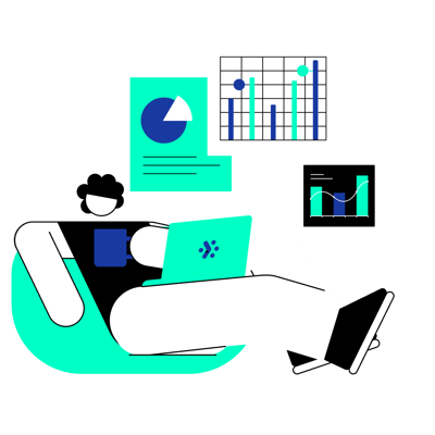 person at laptop with marketing charts
